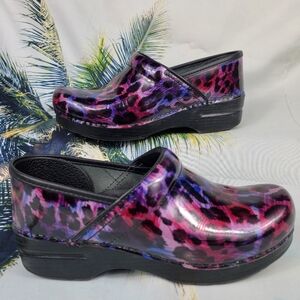 Dansko Women's Mules in Pink and Black Leopard Print